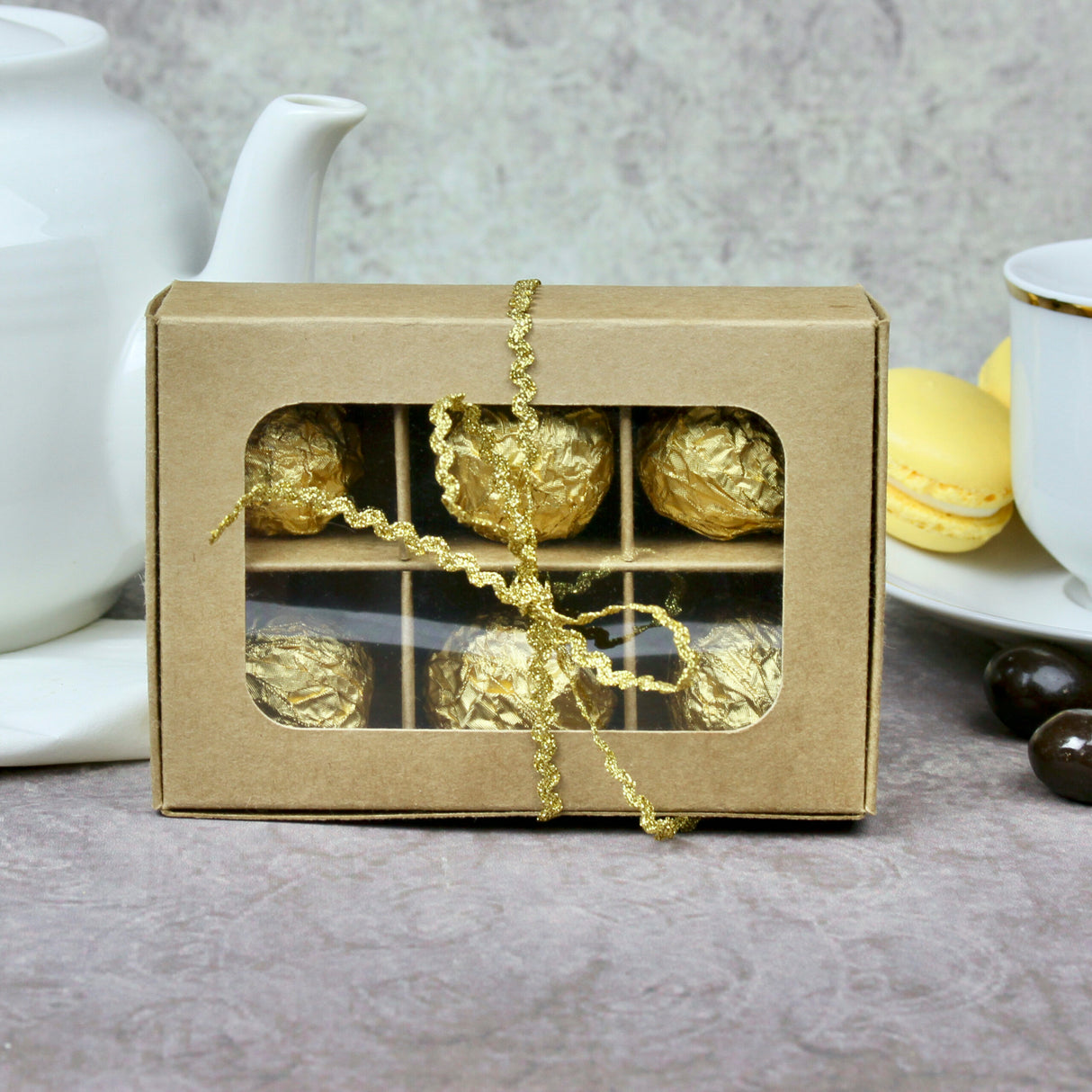 Mini treat box with window and dividers - open box with gold foil-wrapped truffles