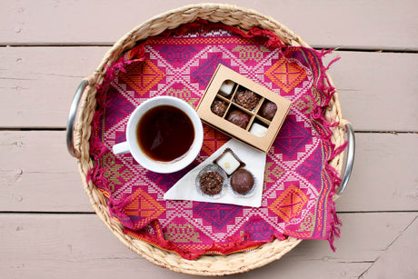 Mini truffle box with window and dividers (6 compartments) sitting on a tray with a cup of coffee