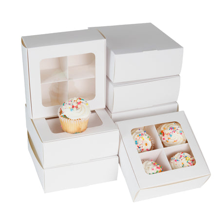 Stack of cookie boxes with dividers and window (four compartments) in white paper, with small cupcakes