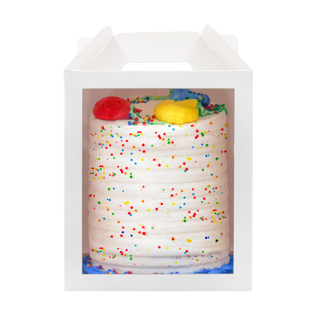 A cake in a 10x10x12 white paper cake box with window and handle
